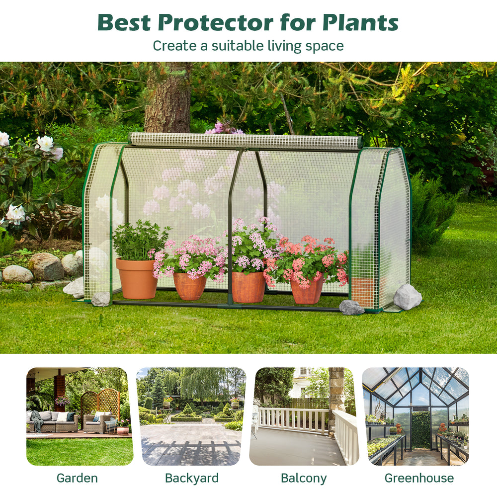 Mini greenhouse with roll-up zipper door, 47.5 x 21.5 x 24 inches, ideal for garden protection and stability.