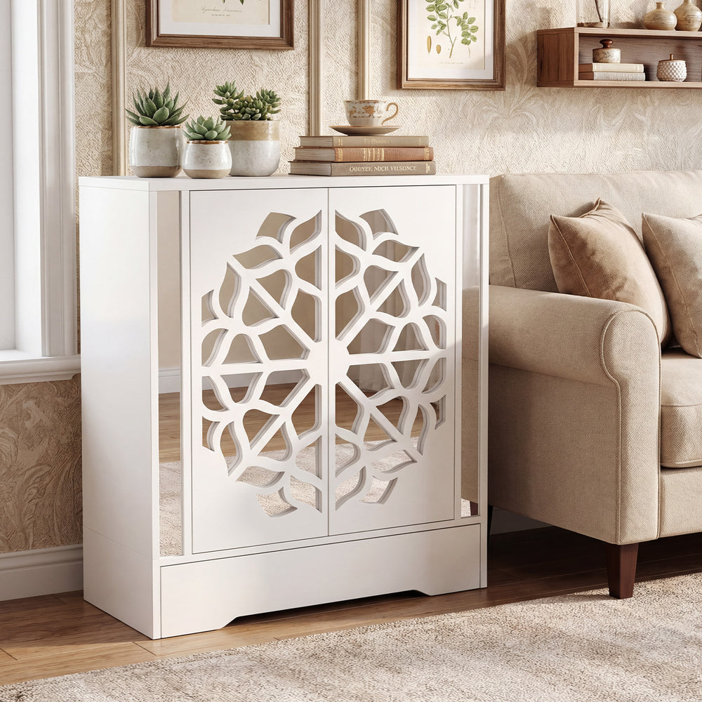 Mirrored shoe cabinet with hollow-carved doors, spacious shelves, and a large drawer for stylish shoe storage in white.