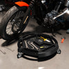 Mobile automotive tool creeper in black with 3 swivel casters and 4 compartments for organized tool storage.