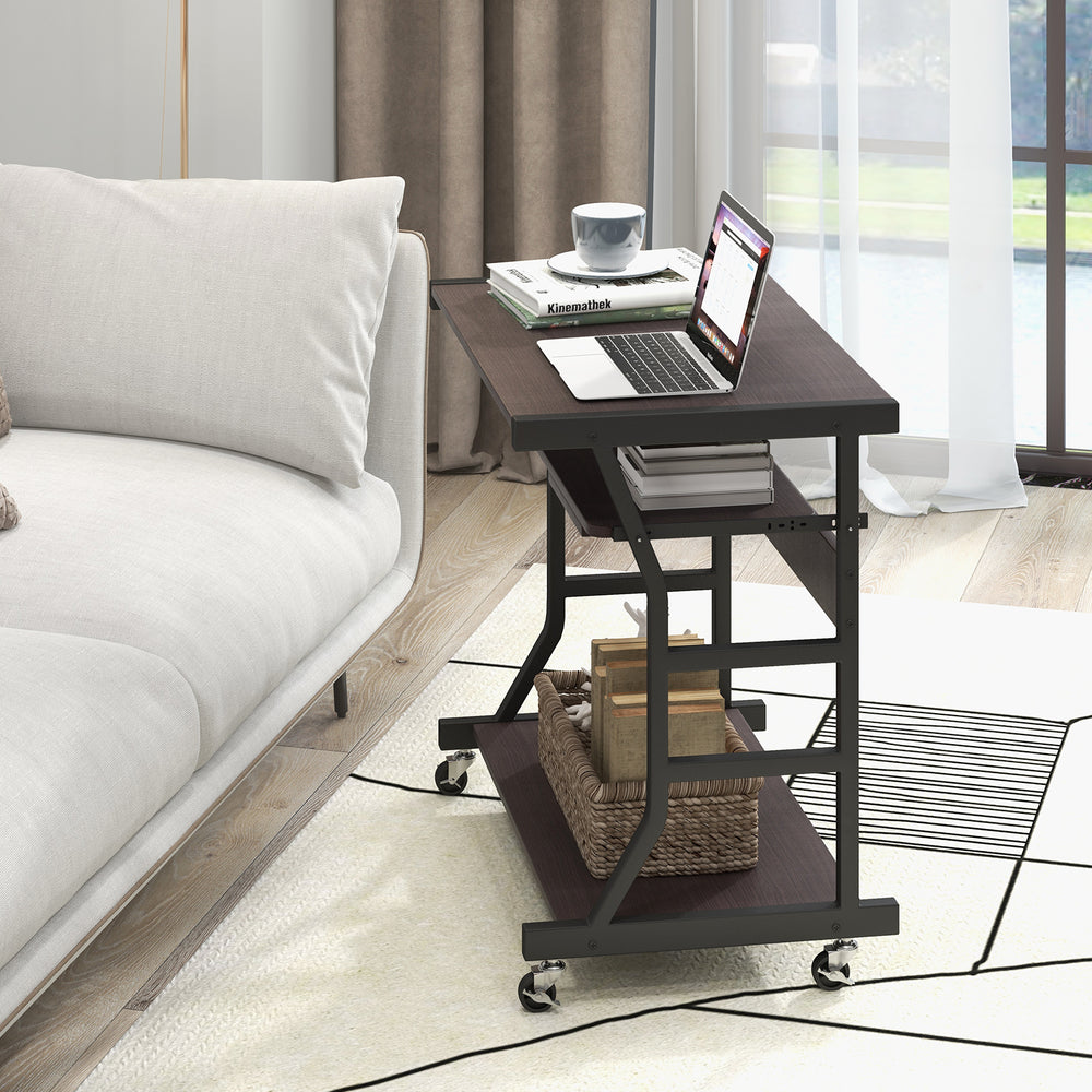 Dark brown mobile computer desk showcasing top view with keyboard and mouse trays, ideal for compact workspaces.