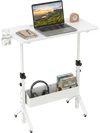 Mobile height adjustable standing desk in white with cup holder, storage basket, and laptop setup for versatile.