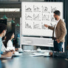 Mobile double-sided magnetic whiteboard with adjustable height, used for presentations in a meeting room setting.