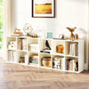 Modern 6-cube bookcase in white, showcasing organized storage for decor, books, and crafts in a living room setting.