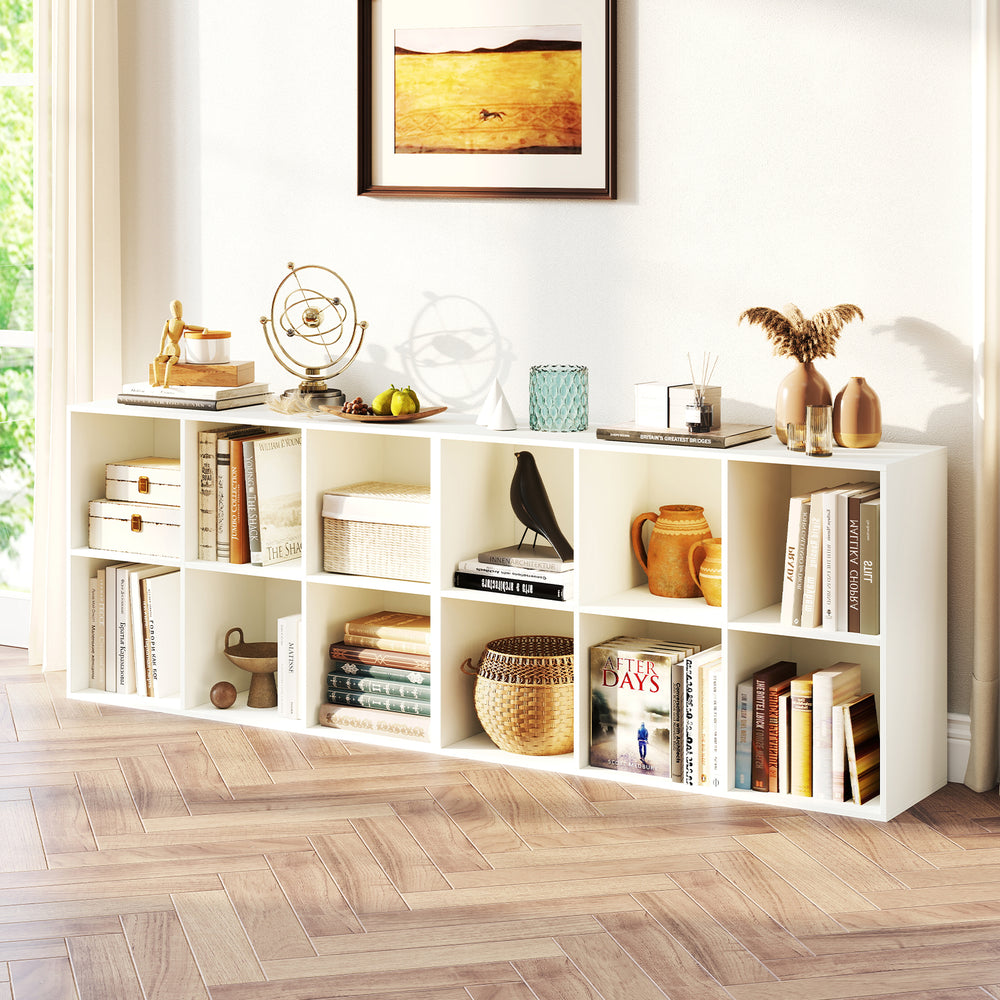 Modern 6-cube bookcase in white, showcasing organized storage for decor, books, and crafts in a living room setting.