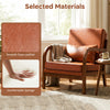 Close-up of the Modern Accent Chair in brown faux leather, featuring a comfortable sponge seat and removable cushions.