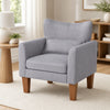 Modern gray accent chair with removable cushion and pillow, designed for comfort and style in living rooms or reading nooks.