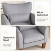 Modern accent chair in gray featuring a spacious seat and wide backrest, perfect for ergonomic comfort in any living space.