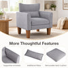 Modern gray accent chair featuring a removable cushion and pillow, designed for comfort in living rooms and reading nooks.