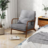 Modern accent chair with rubber wood armrests and gray upholstery, featuring a removable back cushion for comfort and.