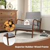 Modern accent chair with gray cushion and rubber wood armrests, designed for comfort and support in any room.