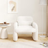 Modern accent chair in beige with armrests and waist pillow, featuring soft sherpa upholstery for living room comfort.