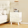 Modern nightstand with 3D geometric patterns, featuring two spacious drawers, perfect for bedside essentials.