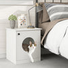Modern cat litter box enclosure in white with a cat emerging from the side, perfect for discreet pet care.