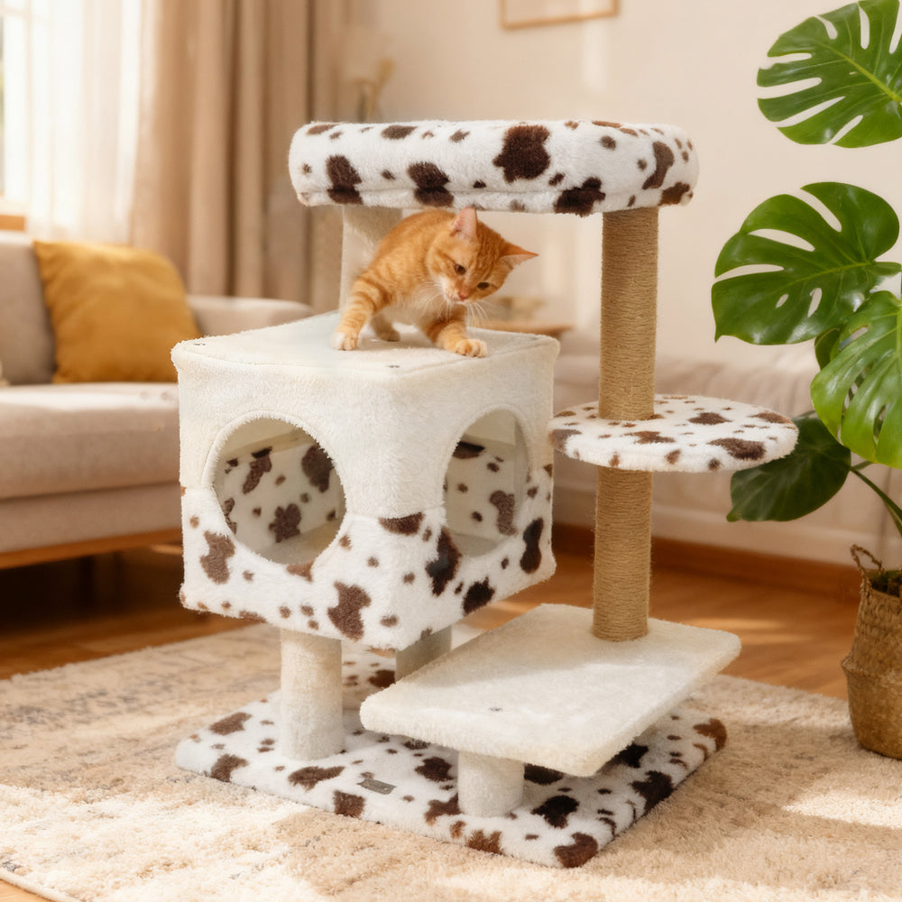 Cat tree with cozy two-door condo, wide perch, and scratching posts, designed for indoor relaxation and climbing.