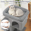 Cozy upholstered top perch with raised edges on a gray cat tree, ideal for observing and relaxing in small spaces.