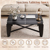 Modern black coffee table with rubber wood cross-leg base, featuring a spacious tabletop for storage and decoration.
