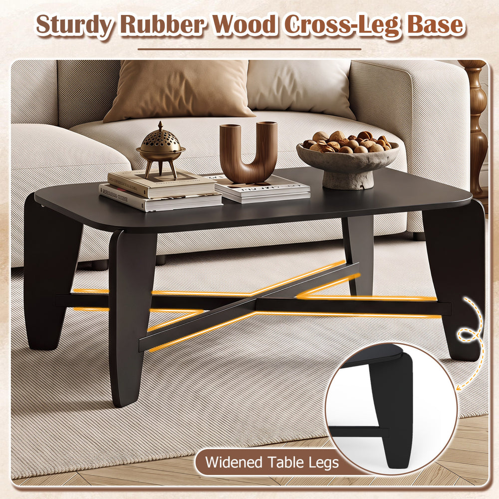 Modern black coffee table with a rubber wood cross-leg base, offering ample storage and stylish design for any room.