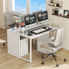 Modern computer desk in white with dual monitors, power outlets, and file drawer for an organized workspace.