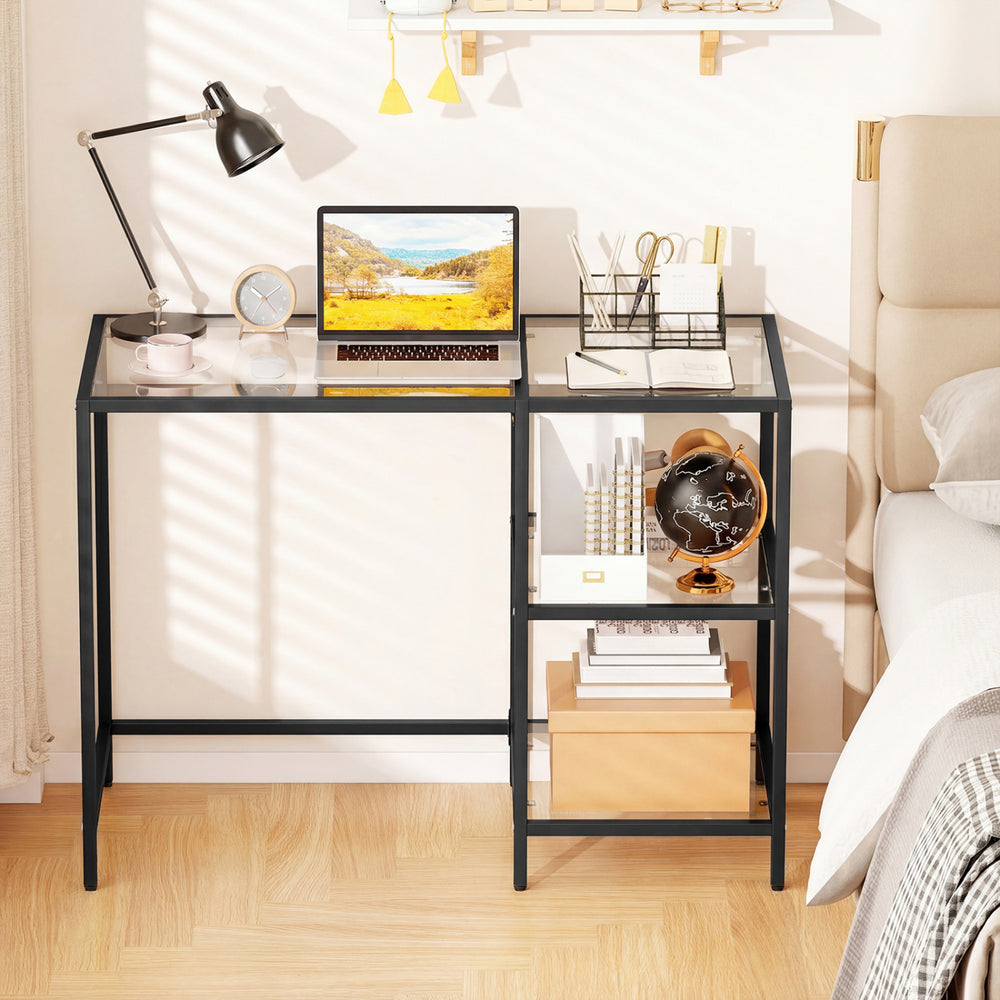 Modern console table with black metal frame, tempered glass top, and two open shelves for stylish home office use.
