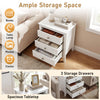 Modern farmhouse 3-drawer nightstand in white with wood grain accents, offering ample storage for books and decor.