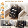 Modern farmhouse 3-drawer nightstand in black with wood grain accents, offering ample storage for books and decor.