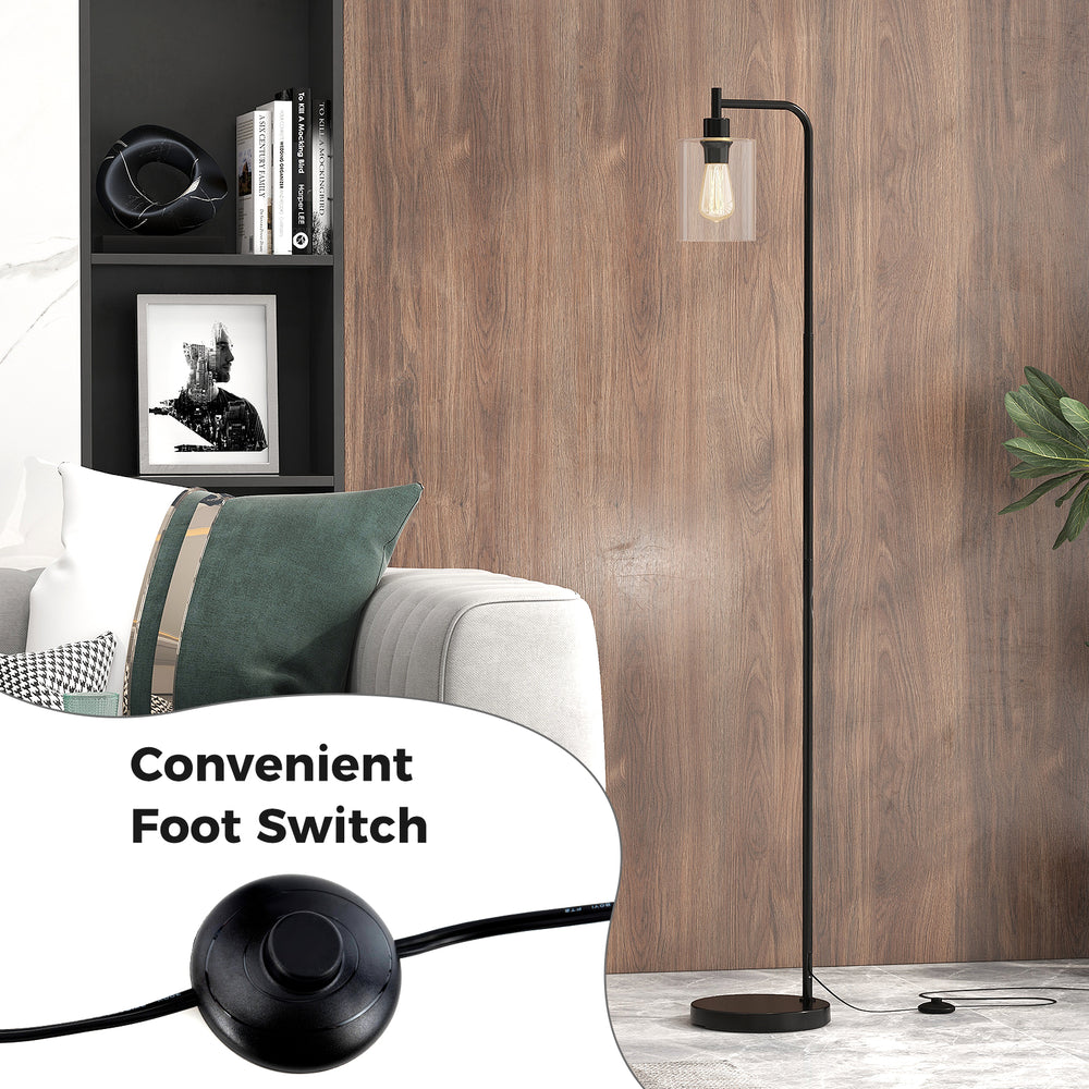 Modern floor lamp with a black finish and clear glass lampshade, featuring a convenient foot switch for easy control.