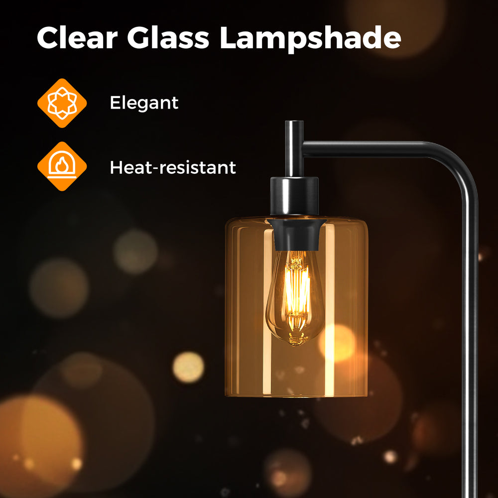 Clear glass lampshade of a modern floor lamp, featuring an elegant design and heat-resistant performance for versatile.