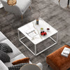 Modern square coffee table with faux marble top and matte steel frame, perfect for living room decor and functionality.