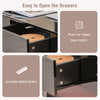 Close-up of push-to-open drawer with smooth metal slides on a modern black LED coffee table for convenient storage.
