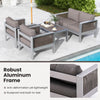 Patio furniture set featuring aluminum armchairs with thick cushions, ideal for outdoor relaxation by the pool.