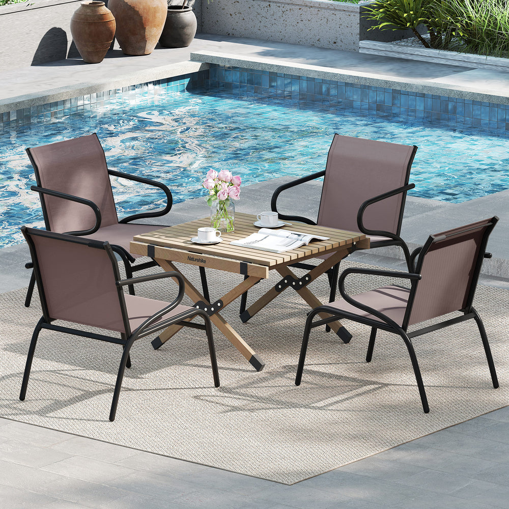 Modern patio chairs set with breathable fabric and ergonomic design, perfect for outdoor relaxation by the poolside.