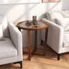 Modern round end table with a transparent tempered glass top and solid acacia wood legs, perfect for living room decor.