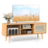 Modern TV stand in natural bamboo with rattan sliding doors, adjustable shelf, and cable management for organized.