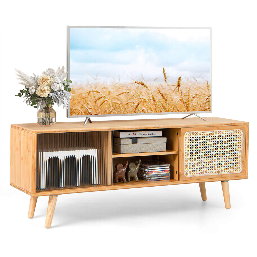 Modern TV stand in natural bamboo with rattan sliding doors, adjustable shelf, and cable management for organized.
