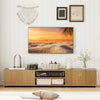 Modern TV stand in natural finish, featuring spacious tabletop for up to 70" TVs and two side cabinets for storage.
