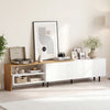 Modern white TV stand with storage shelves and cabinets, designed for 80-inch TVs, styled in a contemporary living room.