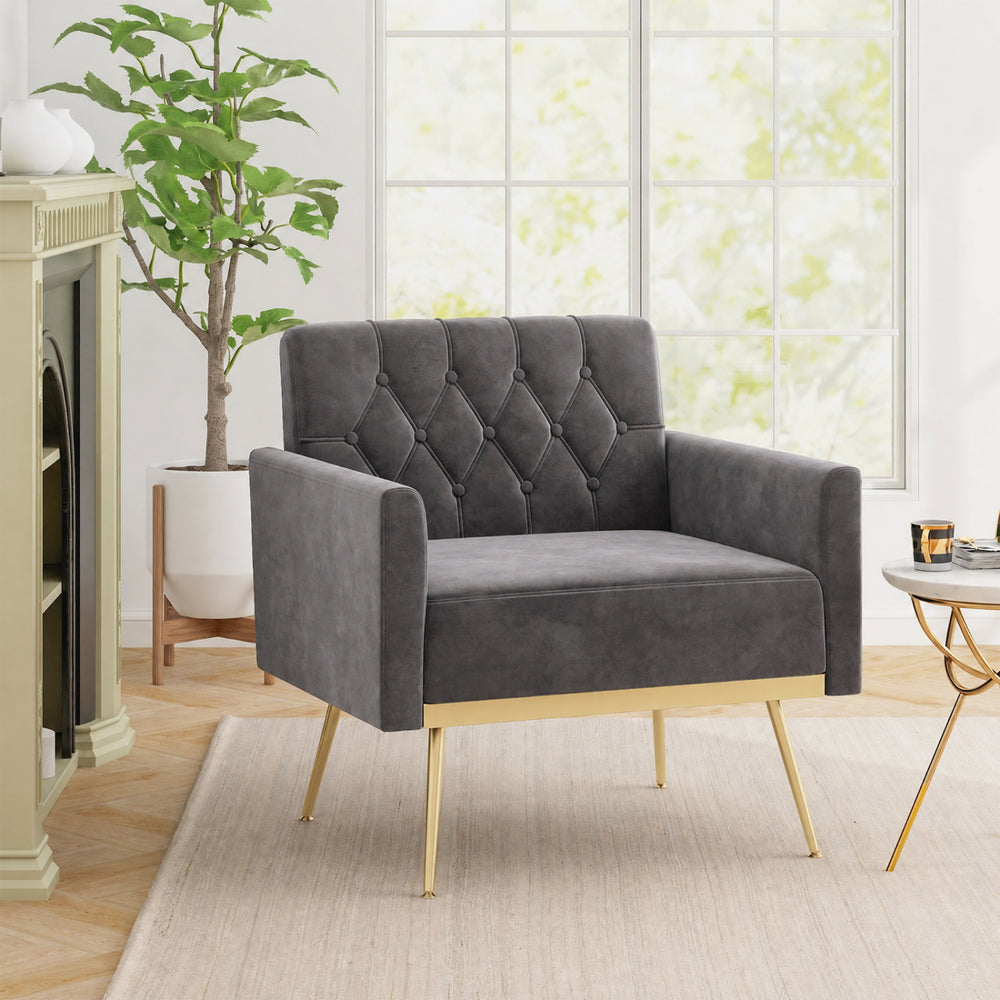 Modern gray velvet accent chair with button-tufted backrest and gold metal legs, perfect for living rooms or offices.