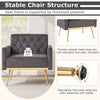 Modern gray velvet accent chair with button-tufted back, adjustable feet, and heavy-duty metal legs for stability.