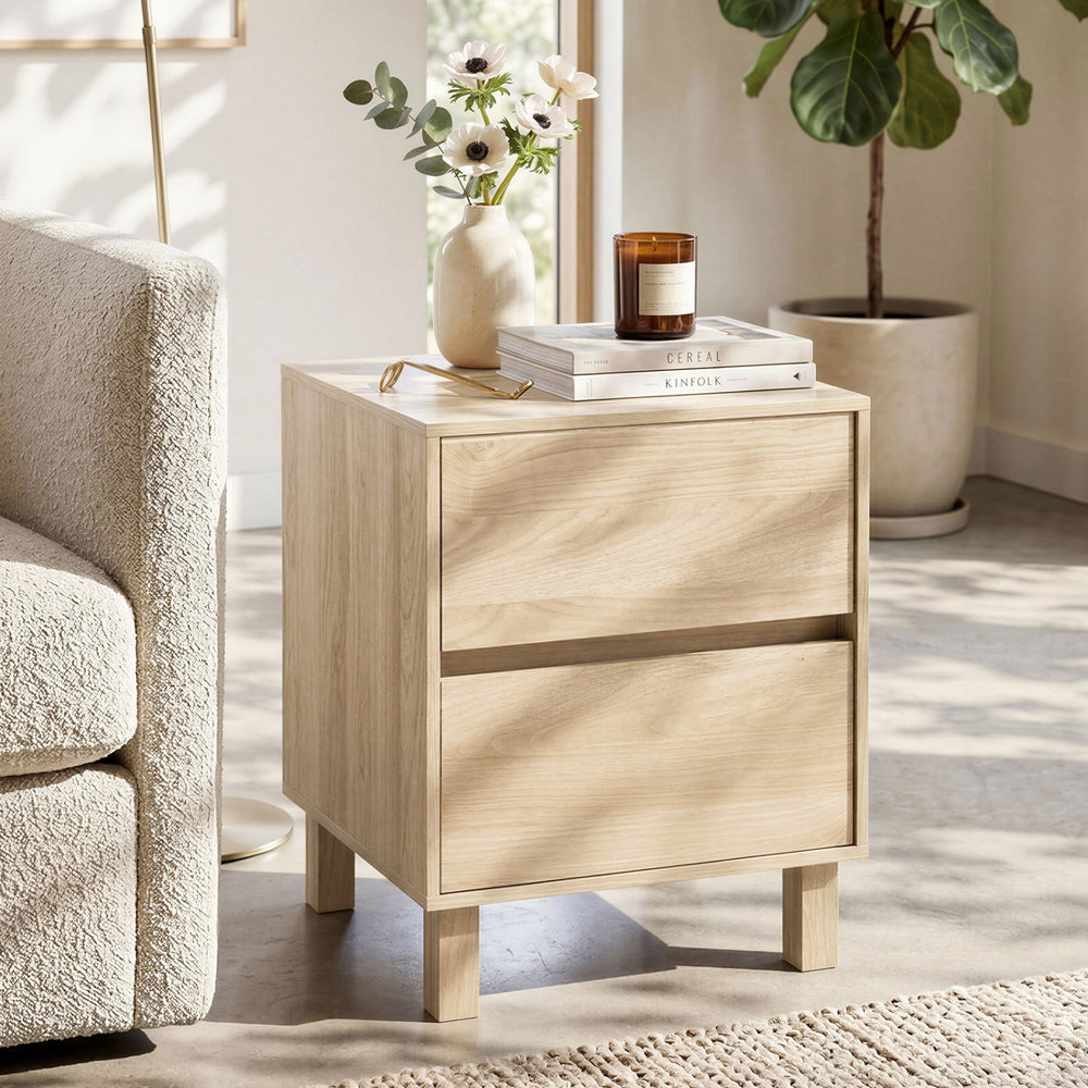 Natural wooden end table with two storage drawers, perfect for minimalist decor in living rooms or bedrooms.