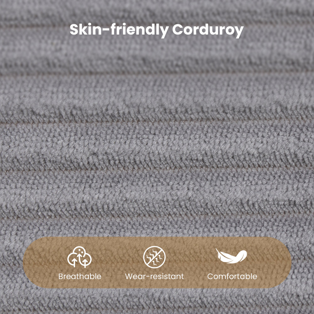 Close-up of skin-friendly corduroy fabric in gray, showcasing its breathable and wear-resistant texture for comfort.
