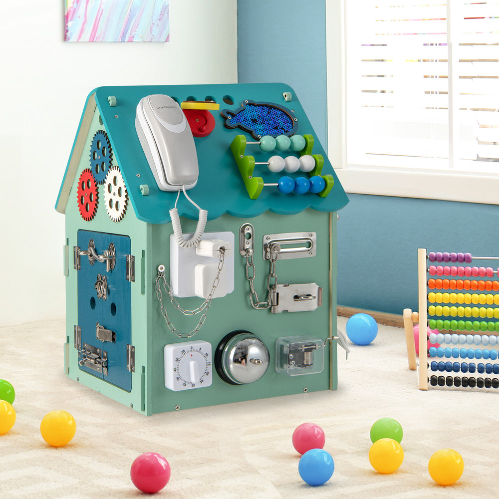 Montessori play house in blue with sensory games, storage space, and various interactive features for skill development.