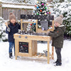 Kids playing with the Mud Kitchen Playset featuring removable sinks, stoves, and kitchenware for outdoor fun.