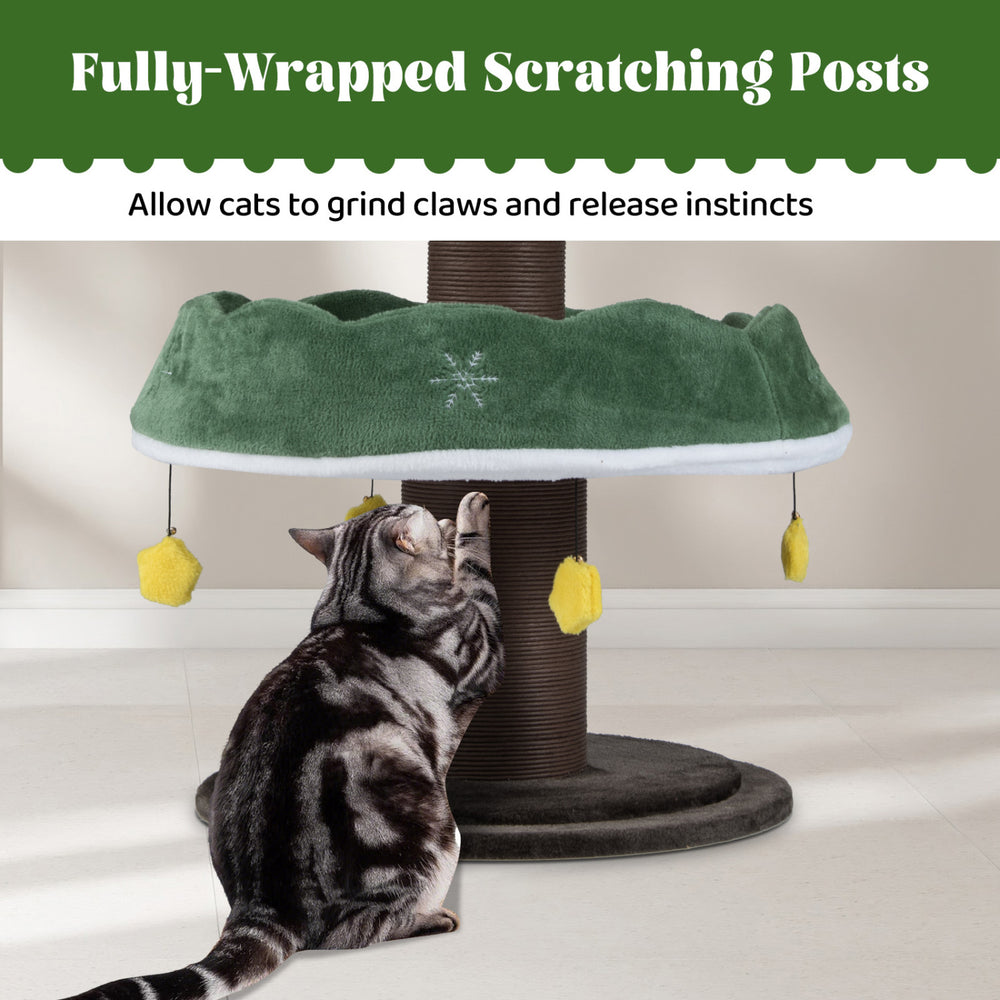 Multi-level Christmas cat tree with green tree-shaped frame, plush cushions, and fully-wrapped scratching posts for playful cats.