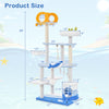 Multi-level ocean-themed cat tree tower in blue with sisal scratching posts and playful fish-shaped hanging balls.