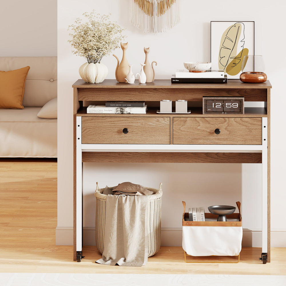 Extendable computer desk in natural finish with two drawers and top shelf, perfect for small spaces and multifunctional.