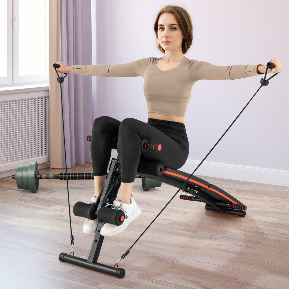 Adjustable multifunctional sit-up bench with comfortable padding, suitable for various workouts and easy storage.