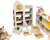 Multipurpose gray toy chest and bookshelf with mobile trolley, featuring organized storage for children's belongings.