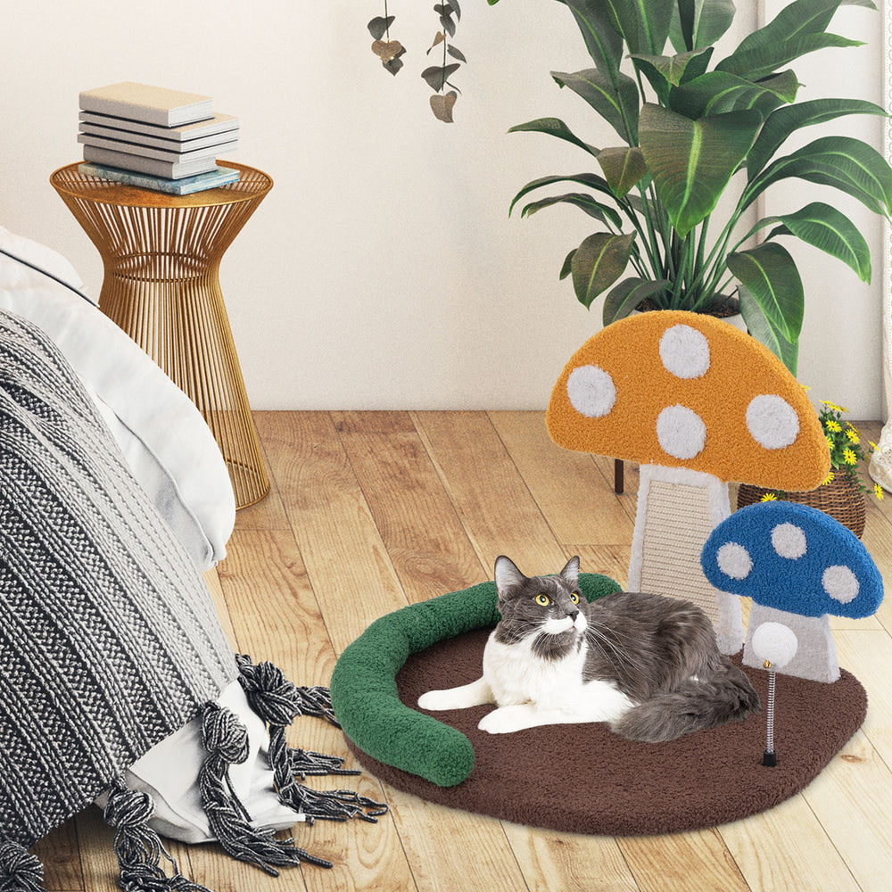 Mushroom cat bed with sisal scratch panel and playful ball, perfect for resting and claw grinding in any room.