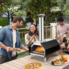 Outdoor pizza oven with foldable legs, cooking a 12" pizza, ideal for camping and outdoor gatherings.