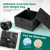 Fillable umbrella base in black, holding 175 lbs with table tray, designed for stability and easy mobility for outdoor.